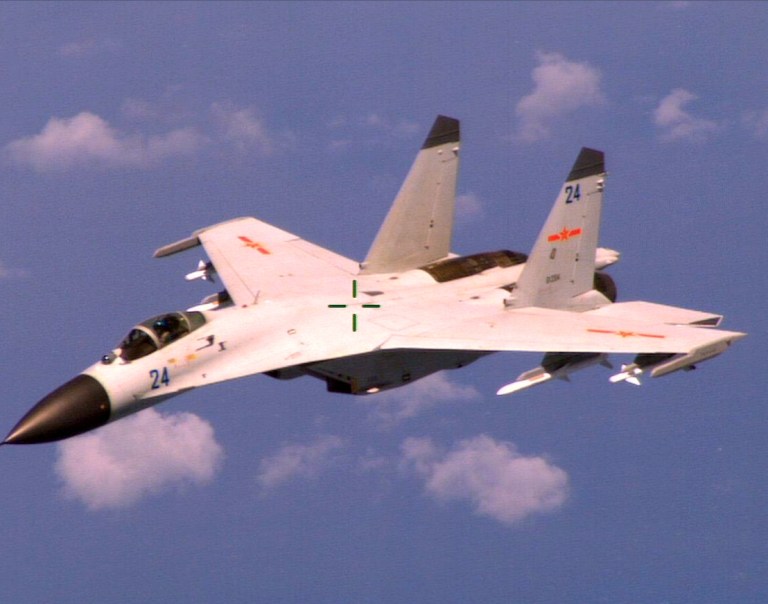 According to reports, at least two Chinese J-11 tactical aircraft carried out the intercept of a U.S. aircraft that was conducting a routine mission in international airspace over the South China Sea. (U.S. Navy Photo/Released)