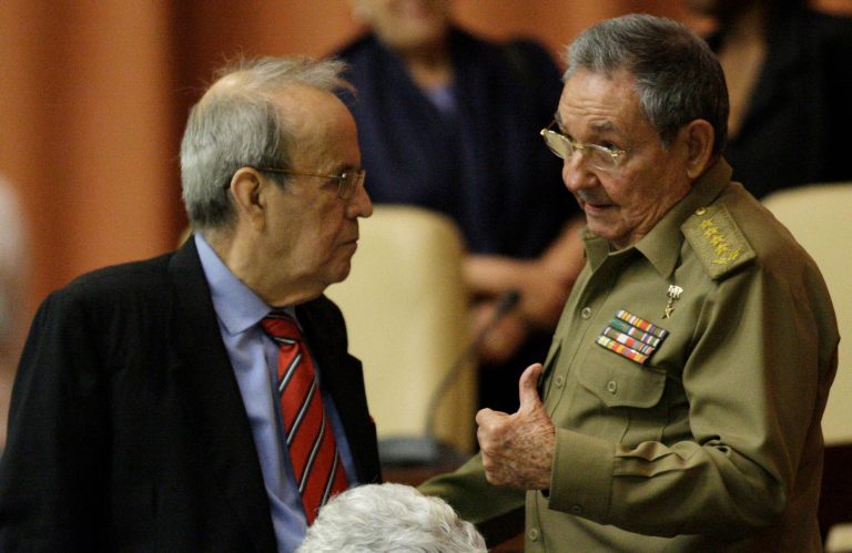   In this Dec. 13, 2012 photo, Cuba's President Raul Castro, right, talks with Ricardo Alarcon, president of the National Assembly, during a session in Havana, Cuba. The leader of Cuba's legislature will apparently be leaving that job in February, when the body reconvenes with new membership. (AP Photo/Ismael Francisco, Cubadebate)  