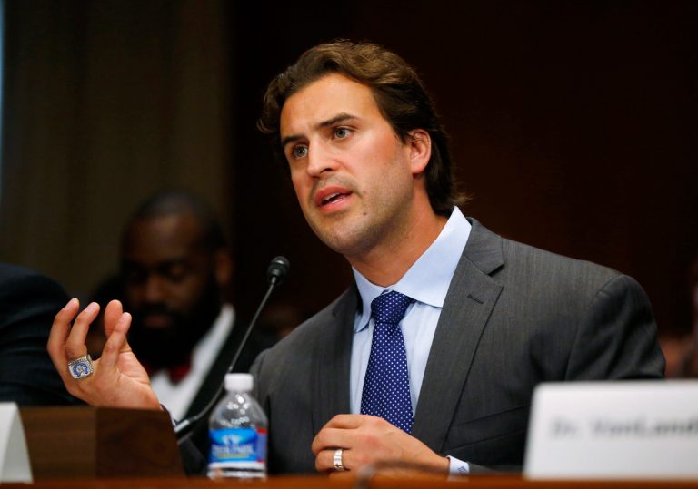 Former professional athlete Ben Utecht, a Super Bowl-winning tight end for the Indianapolis Colts, testifies on Capitol Hill in Washington, Wednesday, June 25, 2014, before the Senate Special Committee on Aging hearing regarding concussions the long term effects of brain related sports injuries. (AP Photo/Charles Dharapak)