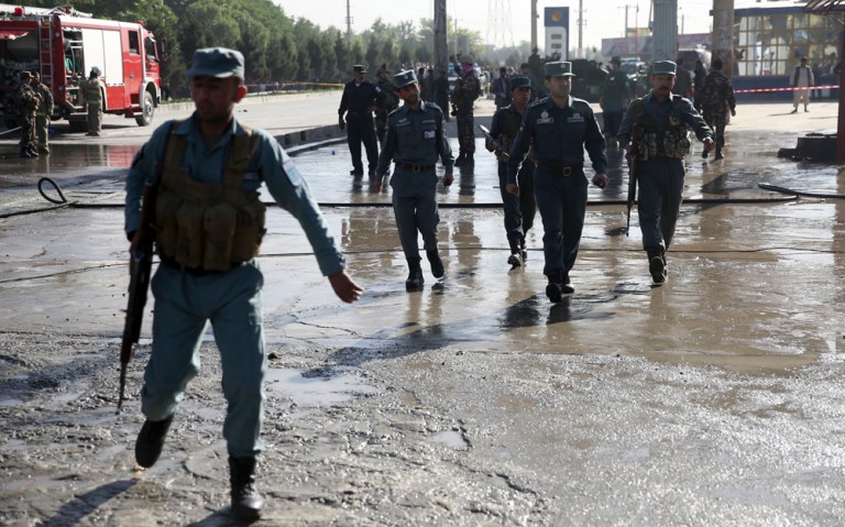 A suicide bomber attacked a convoy of five buses. (AP Photos/Massoud Hossaini)