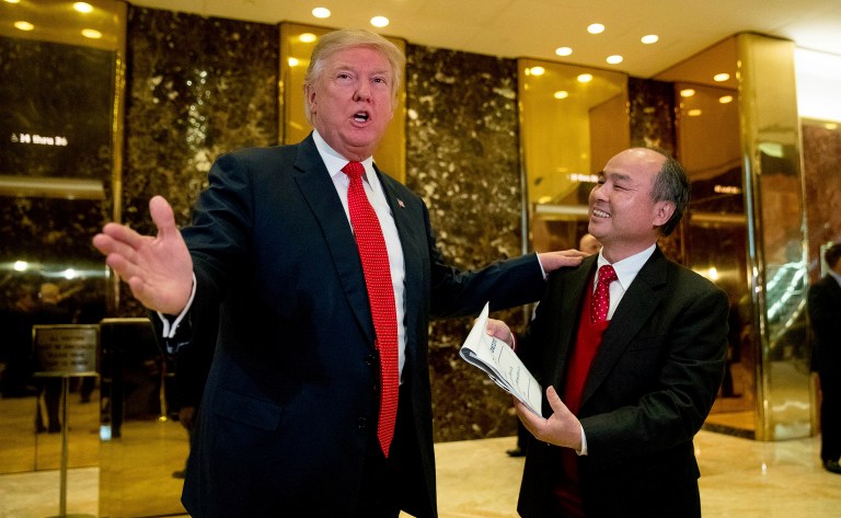 President-elect Trump abruptly claimed Tuesday, in an appearance at Trump Tower and on Twitter, that Softbank, a Japanese telecommunications group, had promised to invest $50 billion in U.S. businesses and to create 50,000 new jobs because of his victory. (AP Photo/Andrew Harnik)