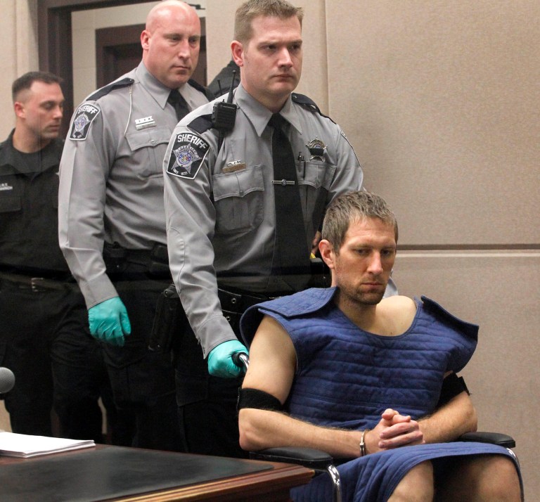  Ben Sebena is brought into intake court in Milwaukee, Thursday, Dec. 27, 2012. Sebena, 30, was charged Thursday with first-degree intentional homicide in the death of his wife, Jennifer Sebena, who was found dead in front of Wauwatosa's fire station by her fellow officers before dawn on Monday. She had been shot five times in the head. (AP Photo/Milwaukee Journal-Sentinel, Kristyna Wentz-Graff)  