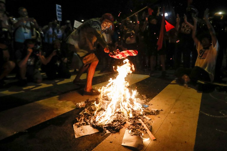 Republican leaders in congress showed no desire to propose changes to the law concerning the burning of the American flag. (AP Photo/John Minchillo)