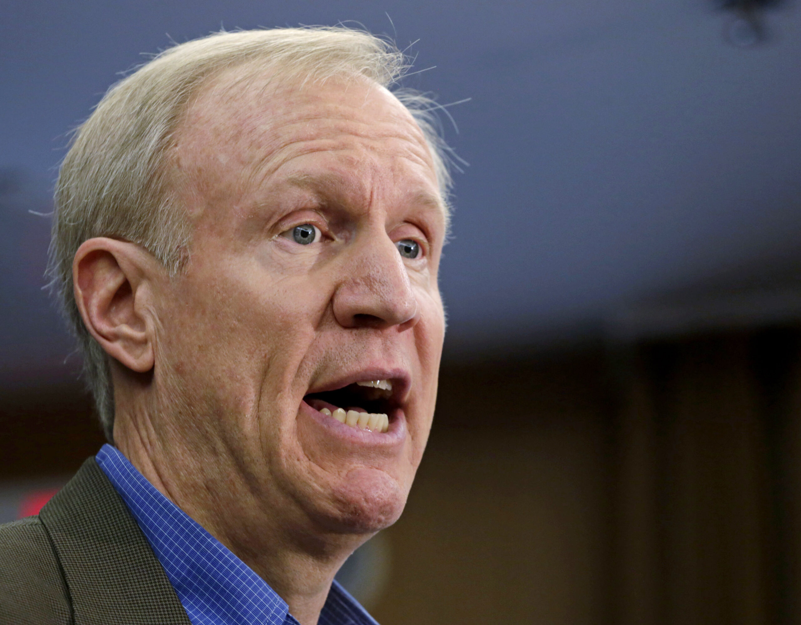 Illinois governor, opponent clash over investments, pensions