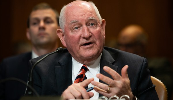 Agriculture Secretary Perdue vows aid to farmers as China tariffs increase