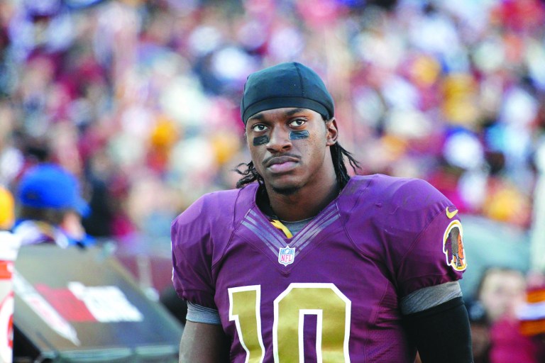 Jennifer Milbrett/The Washington Examiner
Redskins quarterback Robert Griffin III completed 23 of 39 passes for 215 yards and ran 11 times for 53 yards in a loss to the Panthers on Sunday.