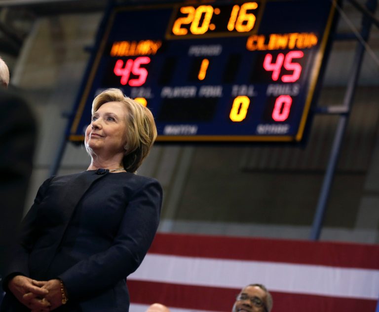 Democratic presidential candidate Hillary Clinton listens as she is introduced during a rally at Cohoes High School on Monday, April 4, 2016, in Cohoes, N.Y. (AP Photo/Mike Groll)