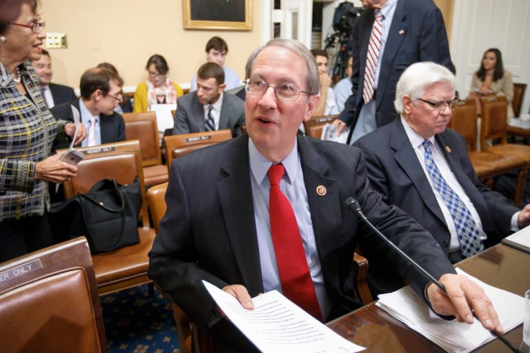 House Judiciary Committee Chairman Rep. Bob Goodlatte, R-Va., left, and House Appropriations Committee Chairman Rep. Hal Rogers, R-Ky., make their presentations ready on Capitol Hill in Washington, Friday, Aug. 1, 2014, as the House Rules Committee met to take the procedural steps to bring a new legislative package to the floor to deal with the influx of migrant children at the U.S.-Mexico border.  (AP Photo/J. Scott Applewhite)