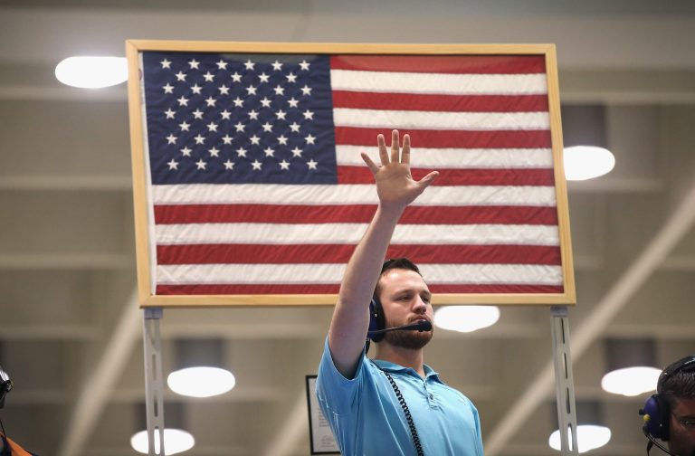 A trader signals an offer in the Standard & Poor's 500 stock index options pit at the Chicago Board Options Exchange (CBOE) on July 30, 2014 in Chicago, Illinois. (Photo by Scott Olson/Getty Images)