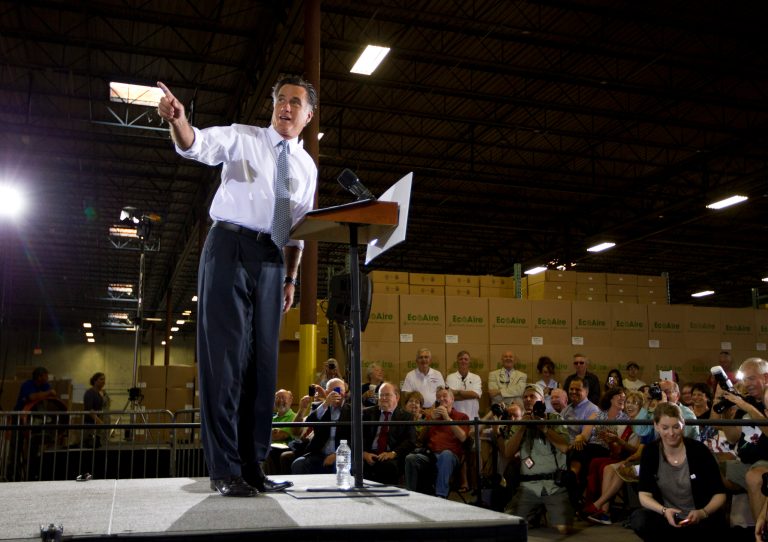   Republican presidential candidate, former Massachusetts Gov. Mitt Romney gestures during a campaign stop at Con-Air Industries, Tuesday, June 12, 2012, in Orlando, Fla. (AP Photo/Evan Vucci)  