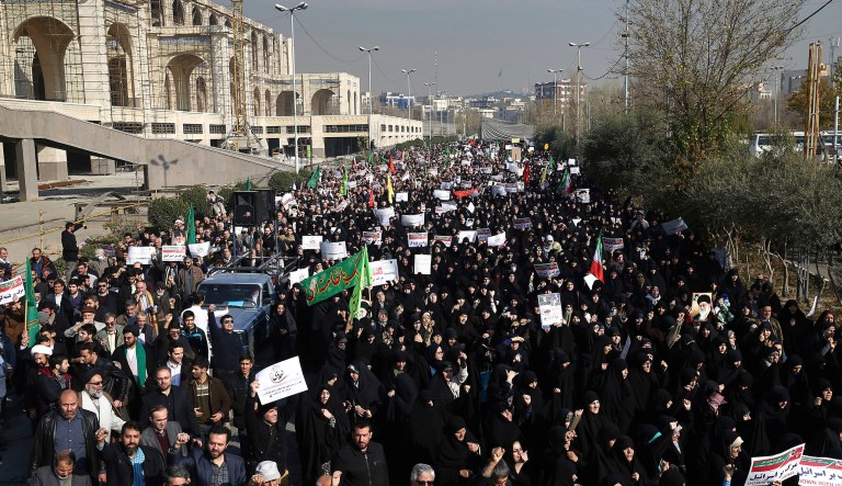 Iranian protesters chant slogans at a rally in Tehran, Iran, Saturday, Dec. 30, 2017. (AP Photo/Ebrahim Noroozi)