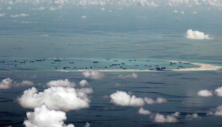 According to a report, the existence of the aircraft hangars in the South China Sea on Fiery Cross, Subi and Mischief Reefs in the Spratly Islands show the country could be preparing for a military deployment. (Ritchie B. Tongo/Pool Photo via AP, File)