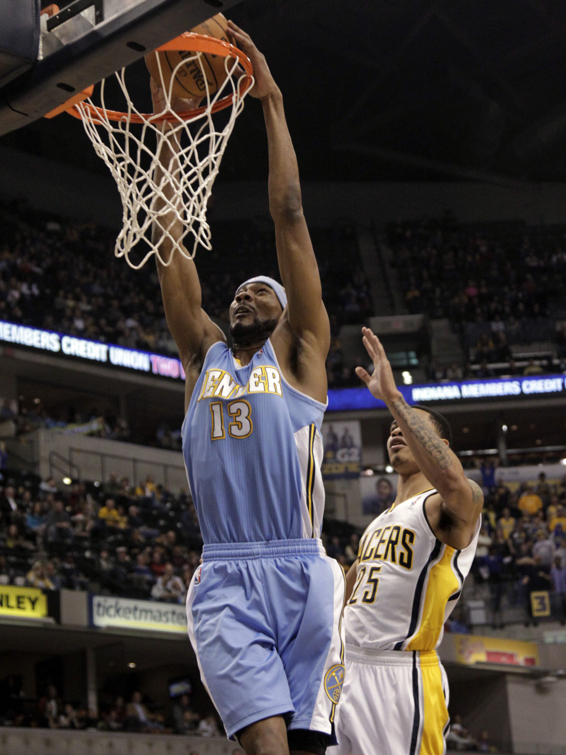 Miller leads Nuggets past Pacers 92-89