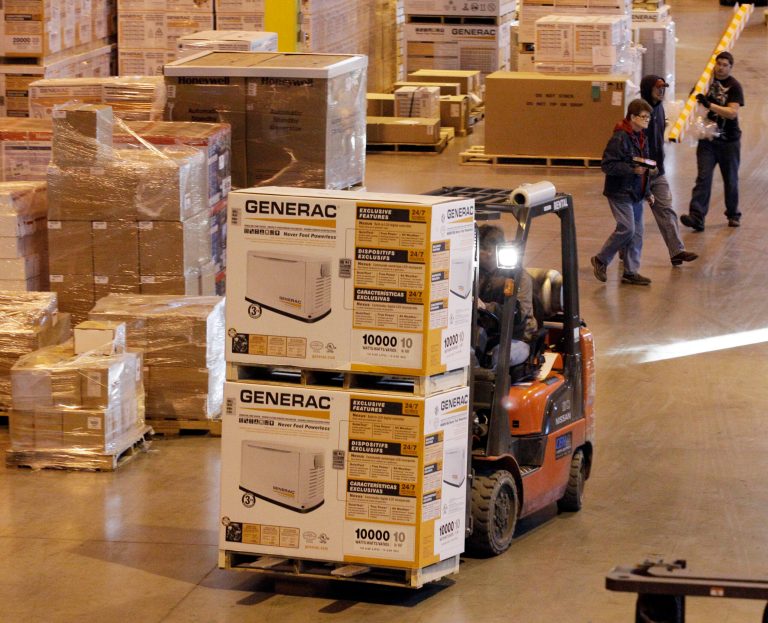   In this Friday, Nov. 16, 2012, photo, employees work at a shipping area of Generac Power Systems, Inc., in Whitewater, Wis., Friday, Nov. 16, 2012. Orders to U.S. factories rose modestly in October, helped by a big gain in demand for equipment that reflects business investment plans. Factory orders edged up 0.8 percent in October, the Commerce Department said Wednesday. That compared to September when orders had jumped 4.5 percent. (AP Photo/Nam Y. Huh)  