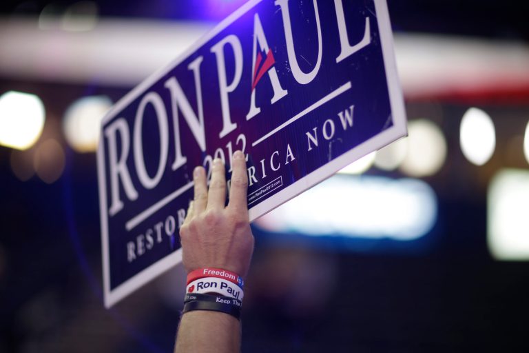 A Ron Paul supporter holds up a sign at the Republican National Convention in Tampa, Fla., on Monday, Aug. 27, 2012. (AP Photo/David Goldman)