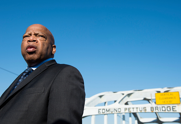 Rep. John Lewis, D-Ga., stands on the Edmund Pettus Bridge in Selma, Ala., in between television interviews on Feb. 14, 2015. Rep. Lewis was beaten by police on the bridge on 'Bloody Sunday' 50 years ago on March 7, 1965, during an attempted march for voting rights from Selma to Montgomery. (Photo By Bill Clark/CQ Roll Call)