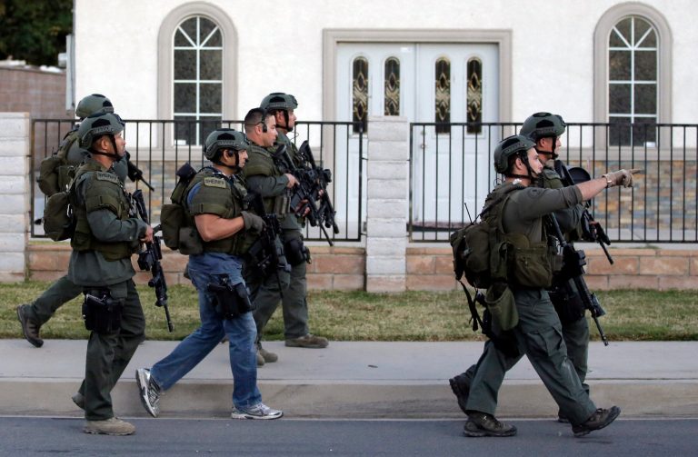 Authorities search for a suspect following a shooting that killed multiple people at a social services facility. The idea that a Planned Parenthood clinic nearly 2 miles away was the target seems to have come from local reporters. (AP Photo/Chris Carlson)