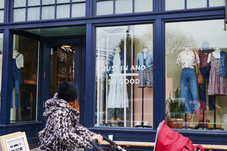 A pedestrian passes in front of a Madewell Inc. store in the Brooklyn borough of New York, U.S., on Friday, April 12, 2019. A proposed spinoff of Madewell could turnÂ J. Crew Group Inc. into an example of what can go right for creditors of struggling retailers, instead of an epithet for everything that could go wrong. 