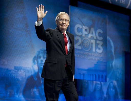 Senate Minority Leader Mitch McConnell of Ky. waves as he arrives to speak at the 40th annual Conservative Political Action Conference in National Harbor.  (AP Photo/Manuel Balce Ceneta)