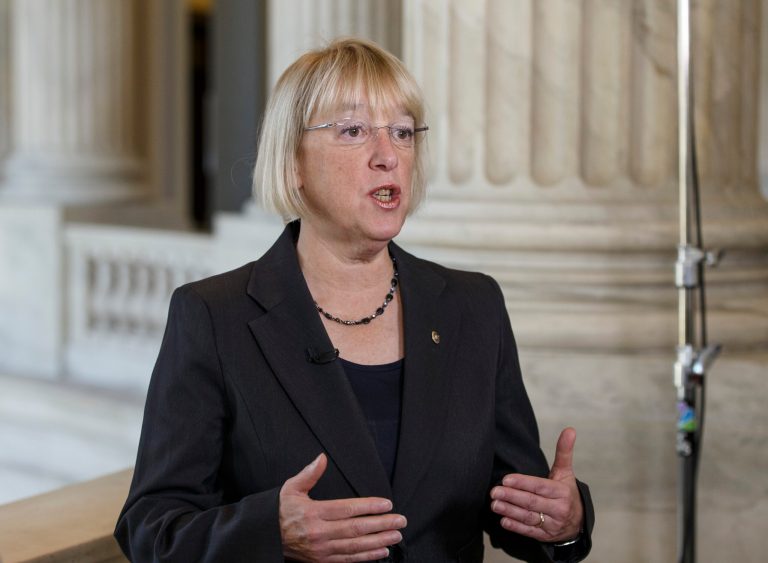 Senate Budget Committee Chairwoman Patty Murray, D-Wash., discusses the compromise spending plan during a television news interview on Capitol Hill on Dec. 18. The bill is designed to keep Congress from lurching from fiscal crisis to fiscal crisis and ease the harshest effects of the automatic budget cuts known as the sequester. (AP Photo/J. Scott Applewhite)