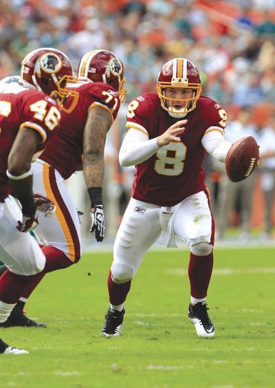 Wilfredo Lee/AP
Washington Redskins quarterback Rex Grossman returned as the starter in a 20-9 loss to Miami after three games as thebackup.