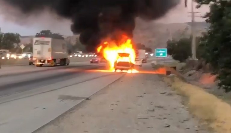 Navy officer driving home from NASCAR race rescues family moments before van explodes