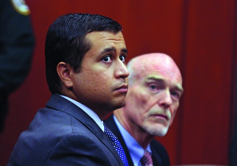 FILE - In this June 29, 2012 file photo, George Zimmerman, left, and attorney Don West appear before Circuit Judge Kenneth R. Lester, Jr. Friday, June 29, 2012, during a bond hearing at the Seminole County Criminal Justice Center in Sanford, Fla. Zimmerman will try to have the murder charge dismissed under Florida's 