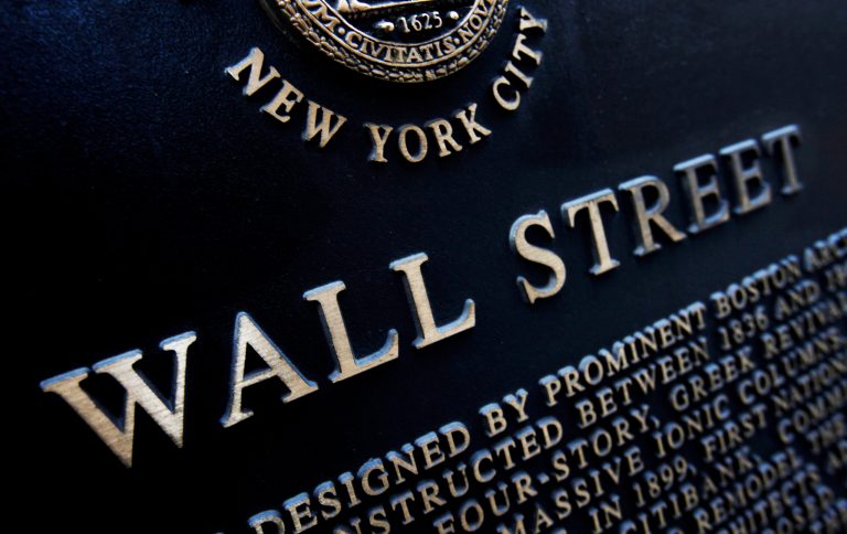 FILE - This Jan. 4, 2010 file photo shows an historic marker on Wall Street in New York.  U.S. stocks are opening lower Friday, July 11, 2014, and are headed for their biggest weekly loss since April. (AP Photo/Mark Lennihan, File)