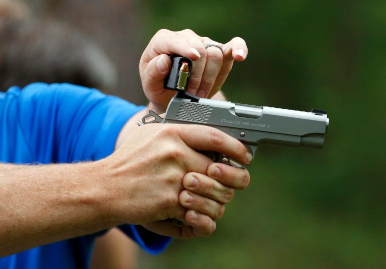 A federal judge has issued a preliminary injunction that halts enforcement of the city's new concealed carry policy. (AP Photo/Rogelio V. Solis)