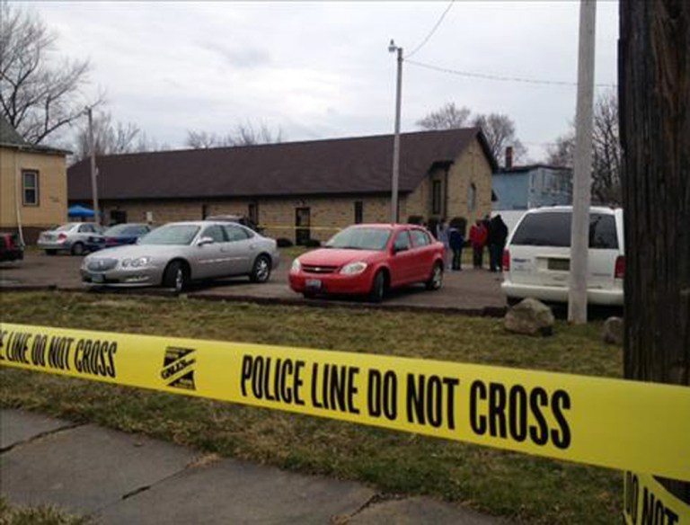 This image provided by WKYC, Channel 3, shows the scene outside a church in Ashtabula, Ohio, on Sunday, March 31, 2013. Police in northeast Ohio are investigating a shooting outside the church that has reportedly left one man dead after an Easter service. (AP Photo/WKYC)