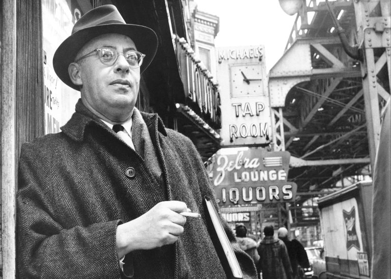 Saul Alinsky, a professional organizer with a strong aversion to welfare programs, is pictured on a street on Chicago's south side where he organized the Woodlawn area to battle slum conditions on Feb. 16, 1966. He was opposed to the government war on poverty as a political welfare scheme. He said the poor must organize and help themselves. (AP Photo)