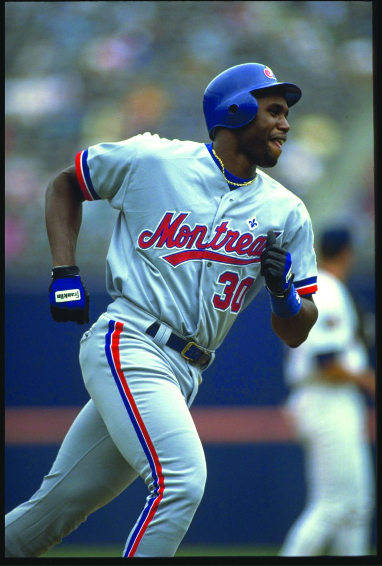 Photos by Stephen Dunn and Patrick McDermott/Getty Images
Adam LaRoche and the 2012 Nationals have better offensive numbers among their infielders than Cliff Floyd and the 1994 Expos.