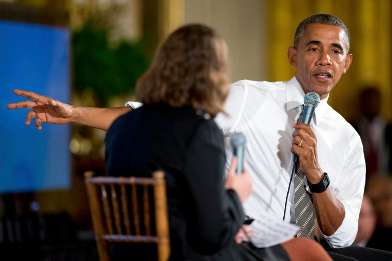 President Barack Obama, accompanied by Michelle Miller, co-founder of coworker.org, left, speaks during a conversation co-hosted by Coworker.org during the White House Summit on Worker Voice, Wednesday, Oct. 7, 2015. (AP Photo/Andrew Harnik)