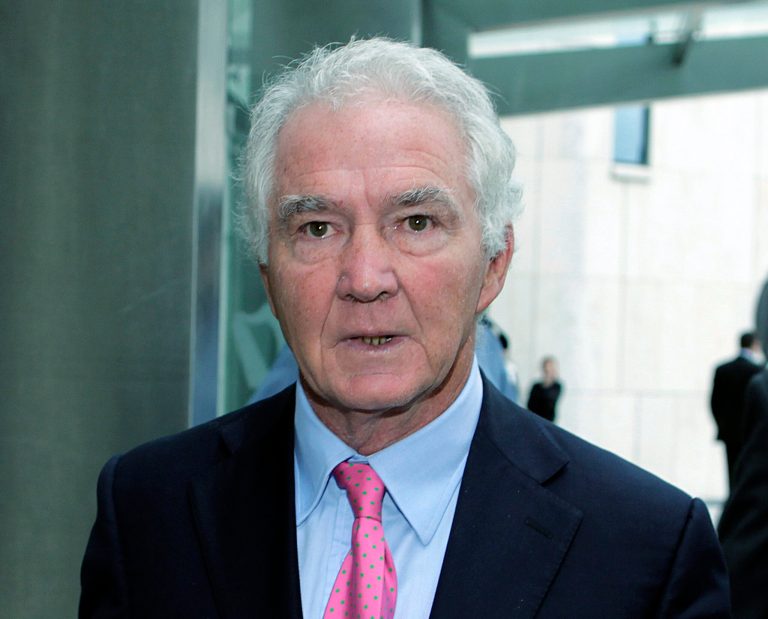   FILE- Former Anglo Irish Bank chief Sean FitzPatrick in this file photo dated Oct. 8, 2012. The 64-year old former chief of Ireland's collapsed Anglo Irish Bank, FitzPatrick, has been arraigned Friday Dec. 21, 2012, in Dublin, Ireland, on 12 new fraud charges of misleading auditors and shareholders over the euro 140 million (US dlrs 180 million) the bank granted him in personal loans. (AP Photo / Julien Behal, PA, FILE) UNITED KINGDOM OUT - NO SALES - NO ARCHIVES  