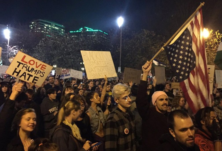 Of the 112 arrested in protests in Portland, Ore., 25 voted. (Jim Ryan/The Oregonian via AP)