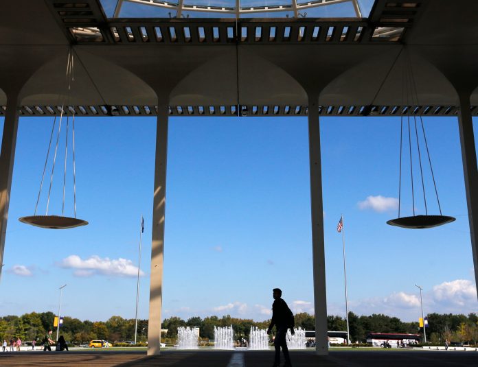 People walk on campus at the University at Albany, in Albany, N.Y.Â In the past year, Albany had 28 reports of sexual assault.Â (AP Photo/Mike Groll)