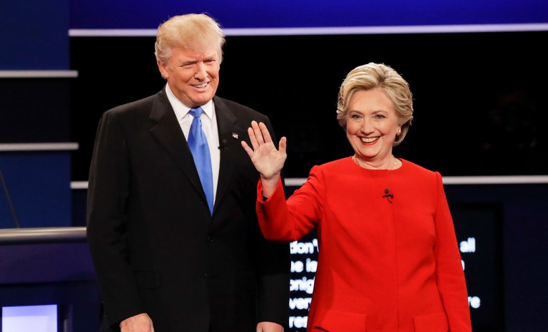 One day after Hillary Clinton and Donald Trump battle on the debate stage for the final time, they will share the spotlight the Al Smith Dinner in New York. (AP Photo/David Goldman)
