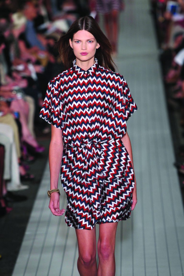 The Tommy Hilfiger Spring 2013 collection is modeled during Fashion Week in New York, Sunday, Sept. 9, 2012. (AP Photo/Seth Wenig)