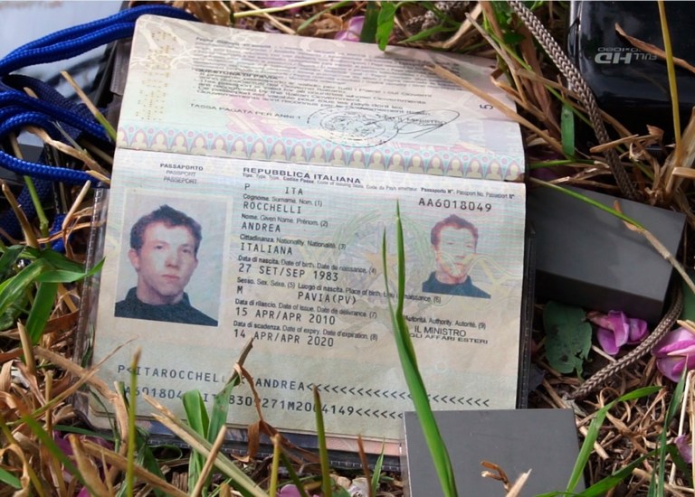 A passport  of Italian photojournalist, 30-year old Andrea Rocchelli, killed Saturday near Slovyansk, is photographed in Slovyansk, Ukraine, Sunday, May 25, 2014. Italy's foreign ministry says an Italian photojournalist has been killed in eastern Ukraine, where he was covering the conflict ahead of the presidential election.  The ministry said in a statement that Andrea Rocchelli, 30, was killed Saturday in the area of Slovyansk, a hotbed of pro-Russia, anti-Kiev sentiment. It stressed that the journalist's body, taken to a hospital along with that of a Russian citizen, was awaiting official identification and that Rocchelli's family was arriving in Kiev later Sunday. (AP Photo/Pool)