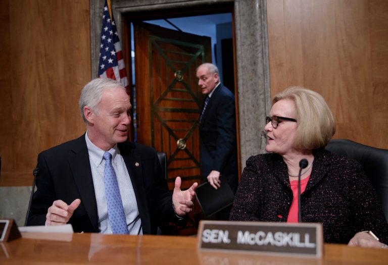 Sen. Ron Johnson, R-Wisc., and Sen. Claire McCaskill, D-Mo., talk as Homeland Security Secretary John Kelly arrives for a hearing on Capitol Hill on April 5. McCaskill said discussions have begun on elevating cybersecurity issues as a function of the Department of Homeland Security. (AP Photo/J. Scott Applewhite)