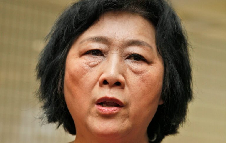 In this June 9, 2012 photo, Chinese journalist Gao Yu, who was imprisoned for nearly 6 year in the 1990s on charges of leaking state secrets, attends an opening ceremony of Chinese artist Liu Xia's photo exhibition in Hong Kong. Prominent Chinese journalist Gao Yu has been 