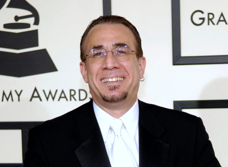   FILE - In this Feb. 10, 2008 file photo, jazz musician Bobby Sanabria arrives at the 50th Annual Grammy Awards in Los Angeles. A year after the Grammy Awards cut 31 categories, sparking protests and a lawsuit by Latin jazz musicians, the music organization has made more changes by adding three awards, including the reinstatement of best Latin jazz album. Sanabria had been the loudest opponent of the academy's decision last year to reduce its categories and fold some genres into larger fields. (AP Photo/Chris Pizzello, file)  