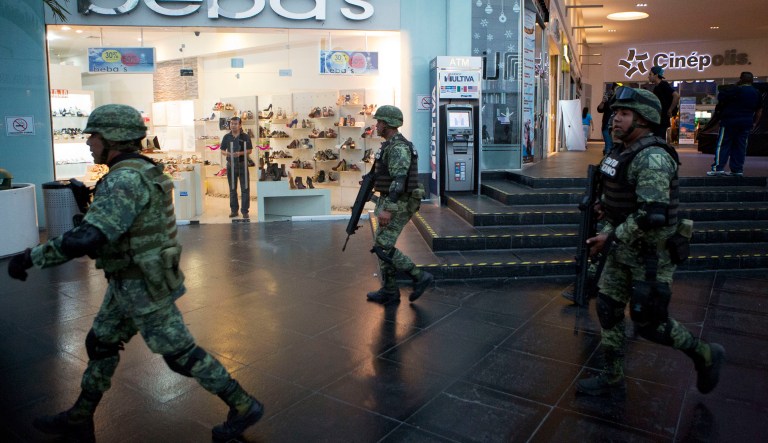 The State Department on Tuesday renewed a travel warning to U.S citizens traveling to parts of Mexico, including tourist destinations such as Cancun and Playa del Carmen, due to ongoing homicides in popular areas of the country. (AP Photo/Rebecca Blackwell)