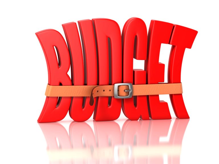 The U.S. budget deficit last month narrowed more than economists forecast as rising employment contributed to the strongest October revenue on record.