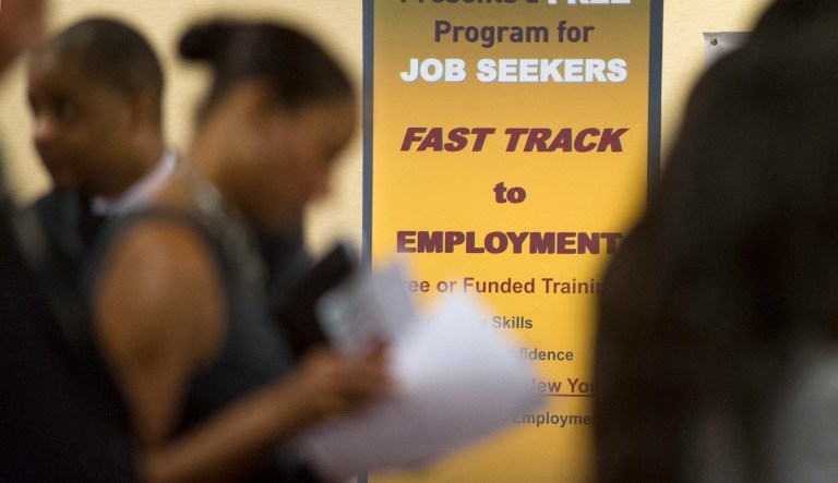 On Thursday, the Labor Department reports on the number of people who applied for unemployment benefits a week earlier. Economists had expected a slight dip in jobless claims to 240,000. (AP Photo/John Amis, File)