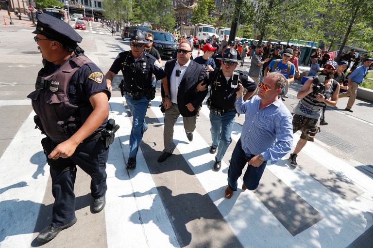 Donald Trump promised to appear on Alex Jones' Infowars radio show soon. He previously did a 30-minute interview with Jones in December. (AP Photo)