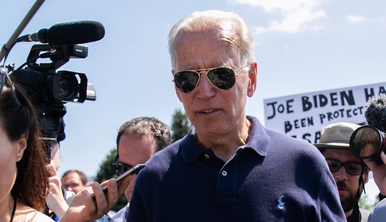 Democratic presidential candidate and former Vice President Joe Biden is surrounded by members of the press after speaking at the Iowa State Fair on Thursday in Des Moines, Iowa. 
