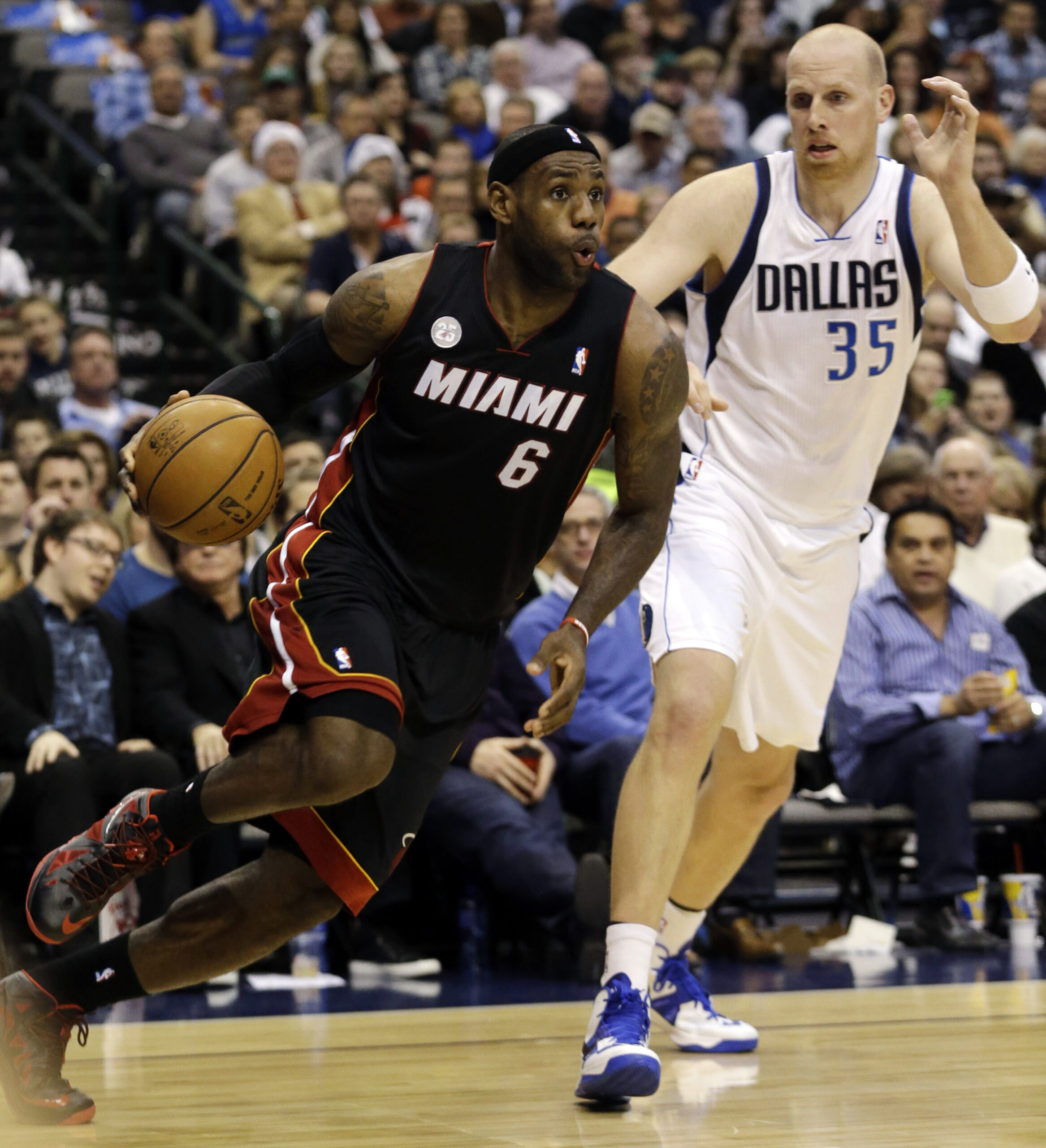 LeBron over 20 again, Heat beat Mavericks 110-95