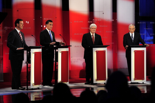 Republican presidential hopefuls Rick Santorum, Mitt Romney, Newt Gingrich and Ron Paul take part in The Republican Presidential Debate at University of South Florida in Tampa, Florida, January 23, 2012. (EMMANUEL DUNAND/AFP/Getty images)