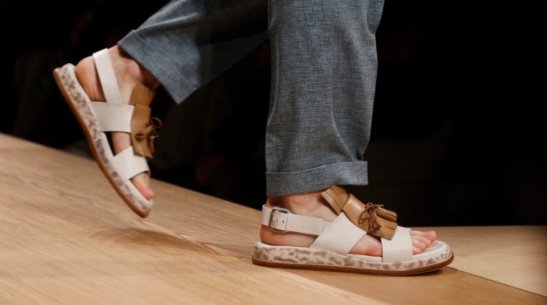 A model wears a creation for Salvatore Ferragamo men's Spring-Summer 2015 collection, part of the Milan Fashion Week, unveiled in Milan, Italy, Sunday, June 22, 2014. (AP Photo/Luca Bruno)